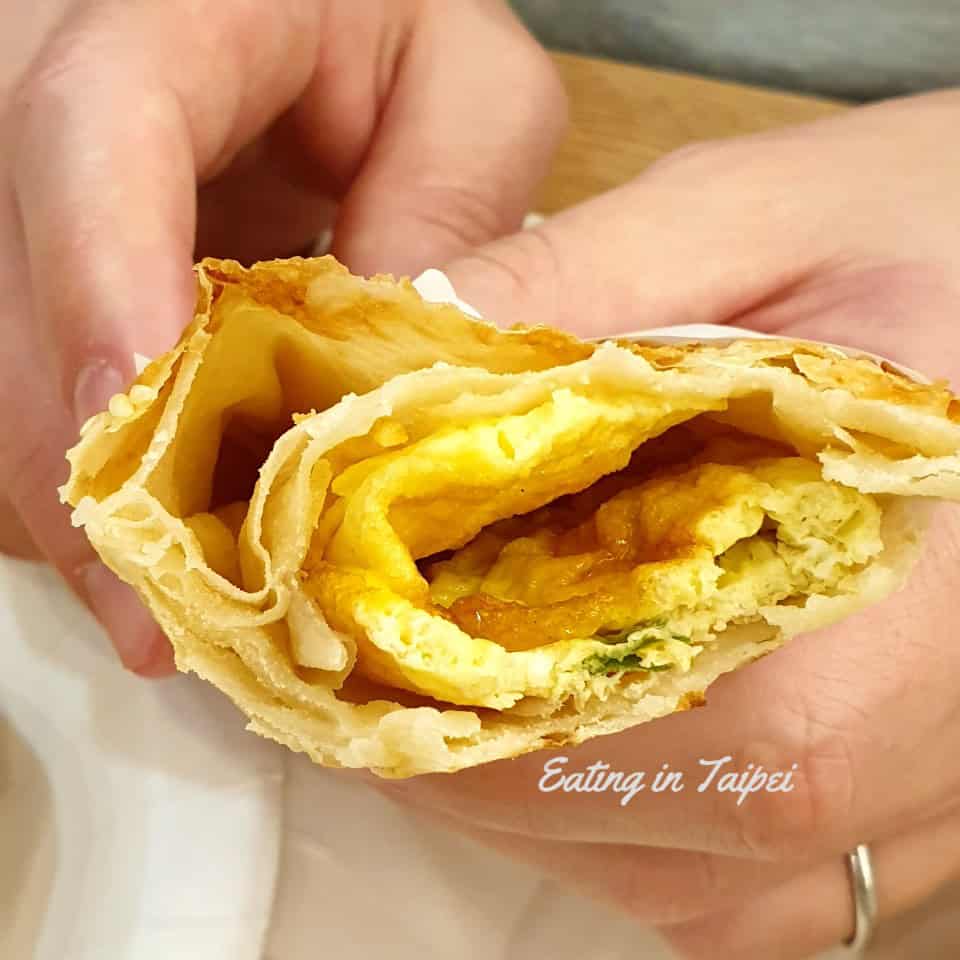 clay oven roll with green onion and egg